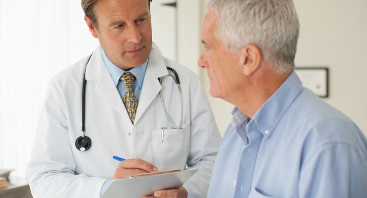 0147_171631860 older man talking to his doctor